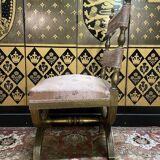 Chaise curule dorée