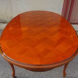 Large oval table in Regency style, extensions under the top.