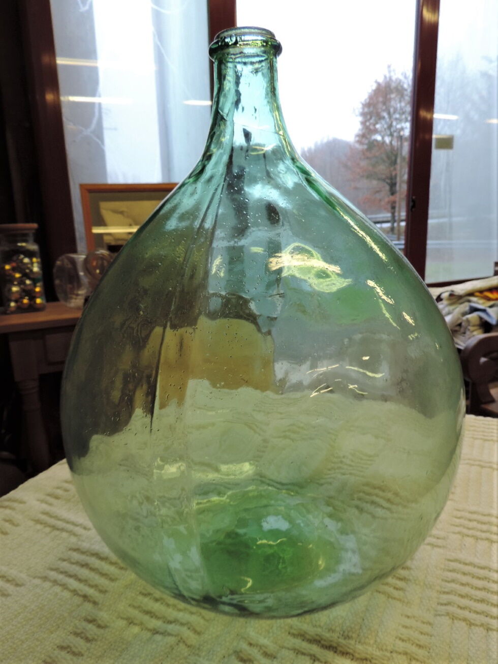 Dame-Jeanne or old glass bottle