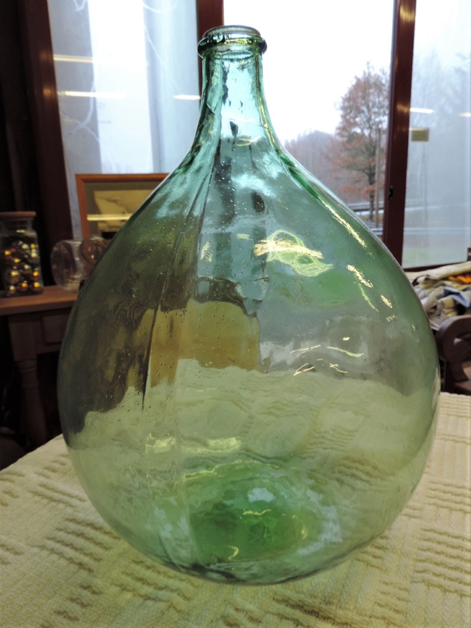 Dame-Jeanne or old glass bottle