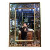 Venetian mirror in eglomise glass and gilded wood