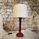 Brick/burgundy colored wooden bedside lamp duo