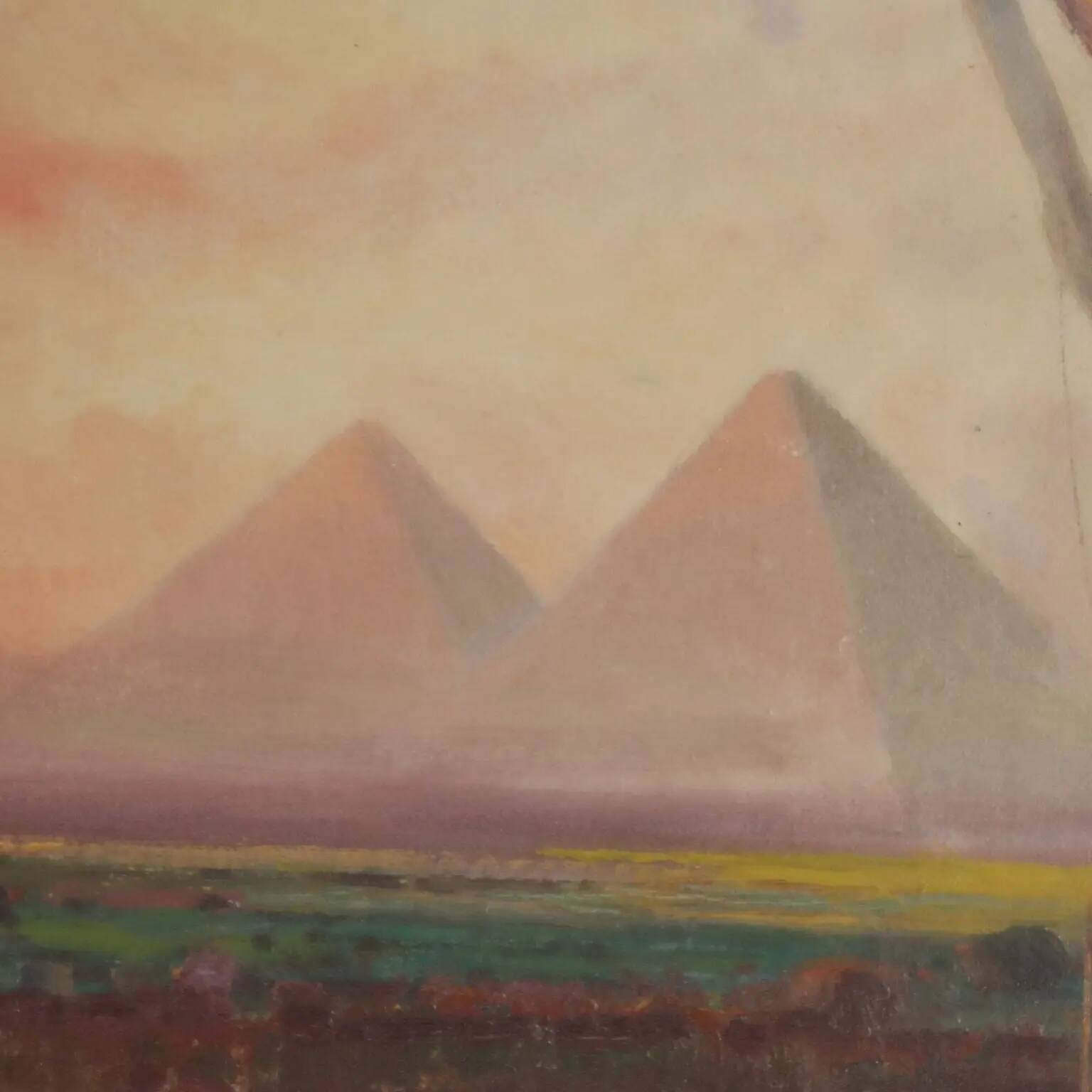 Ancient painting of an exotic landscape with pyramids and figures from the 1800s.