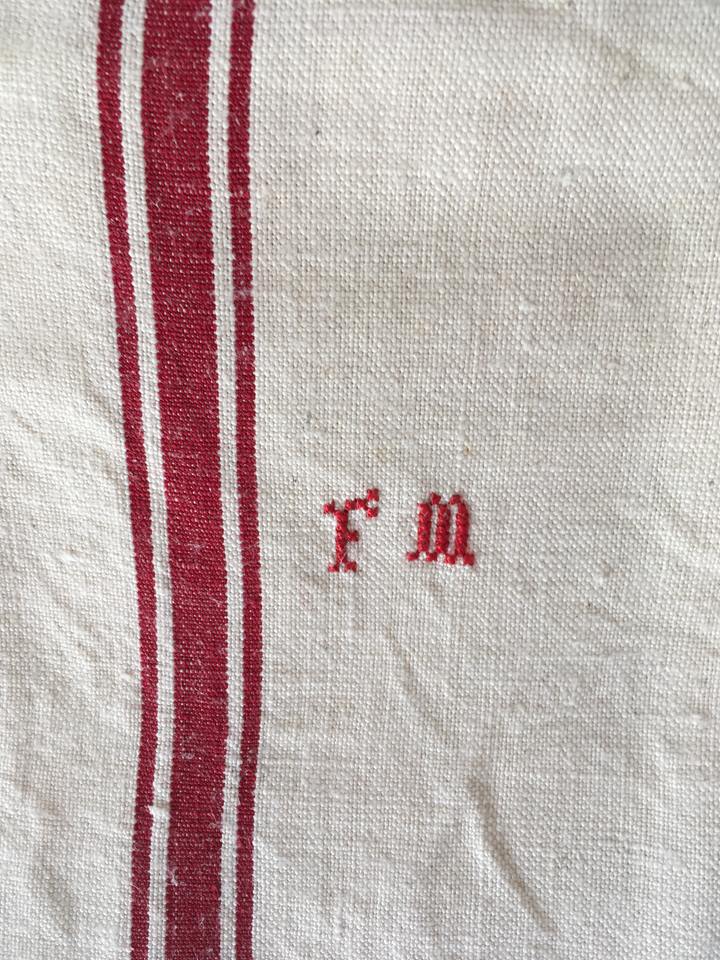 Two mismatched former dishcloths in red and white.