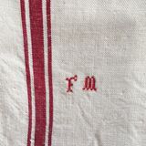 Two mismatched former dishcloths in red and white.