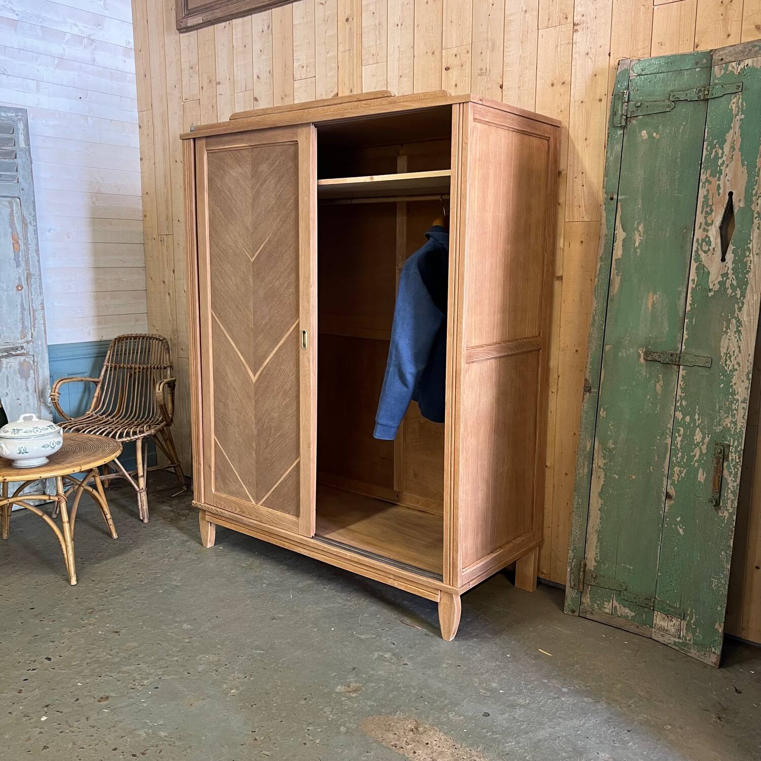Vintage sliding wardrobe in raw oak