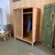 Vintage sliding wardrobe in raw oak