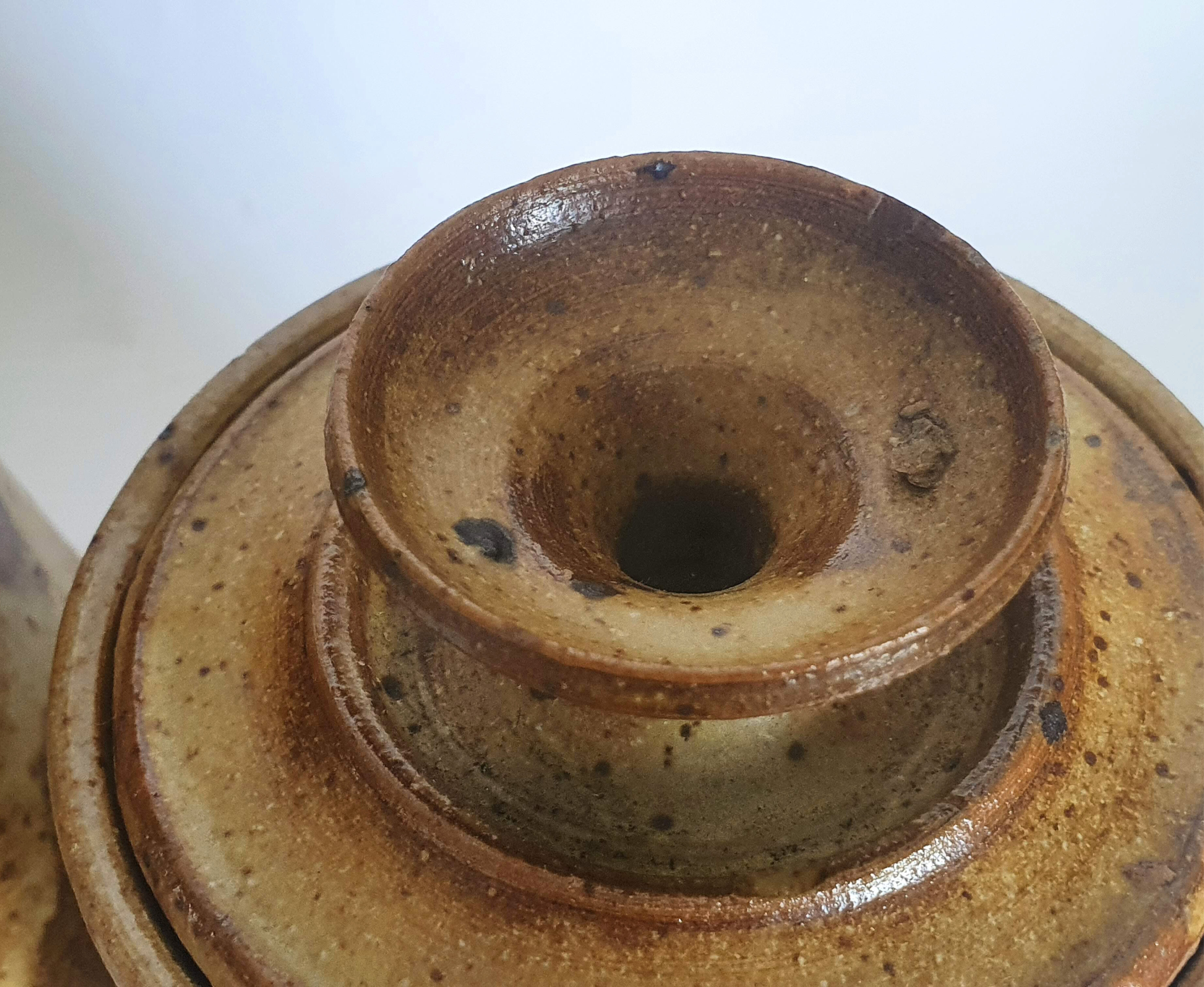 Covered pyrity sandstone pots signed GRM