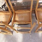 5 Scandinavian style chairs, wood and black faux leather.