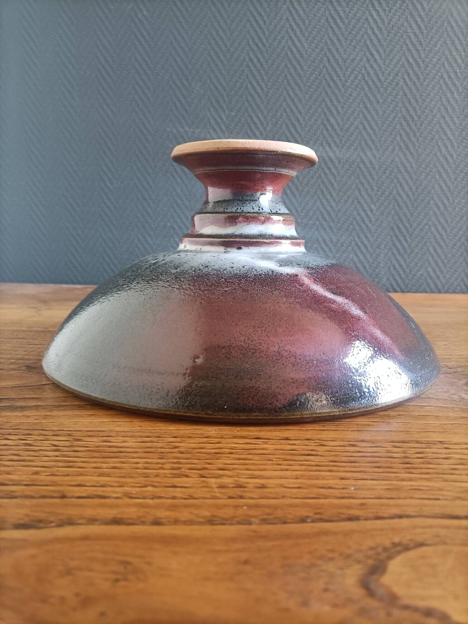 Signed ceramic fruit bowl on foot