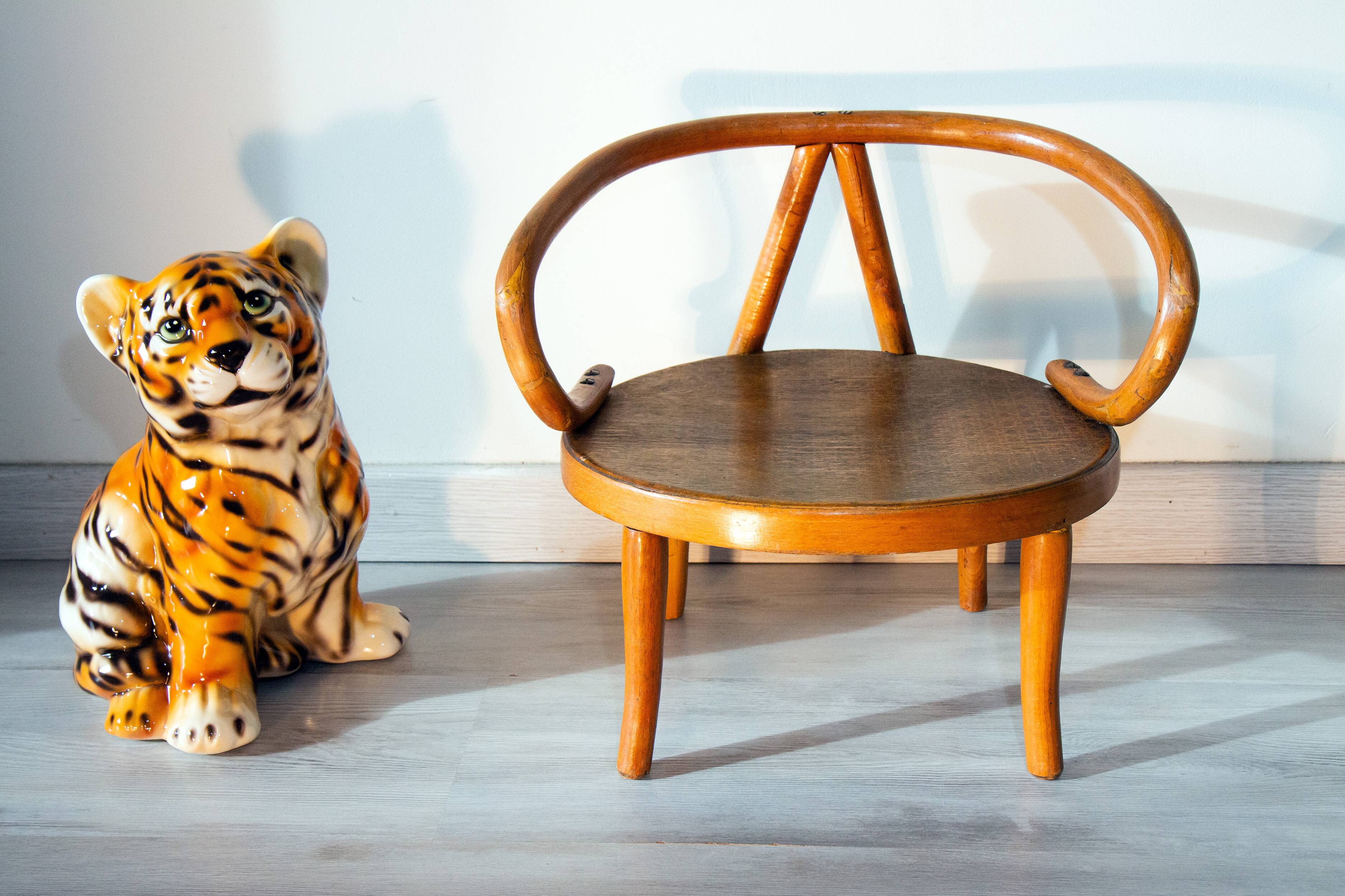 Le Corbusier style curved wood children's armchair, early 20th century