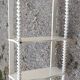 charming curved shelf with 2 turned wooden supports