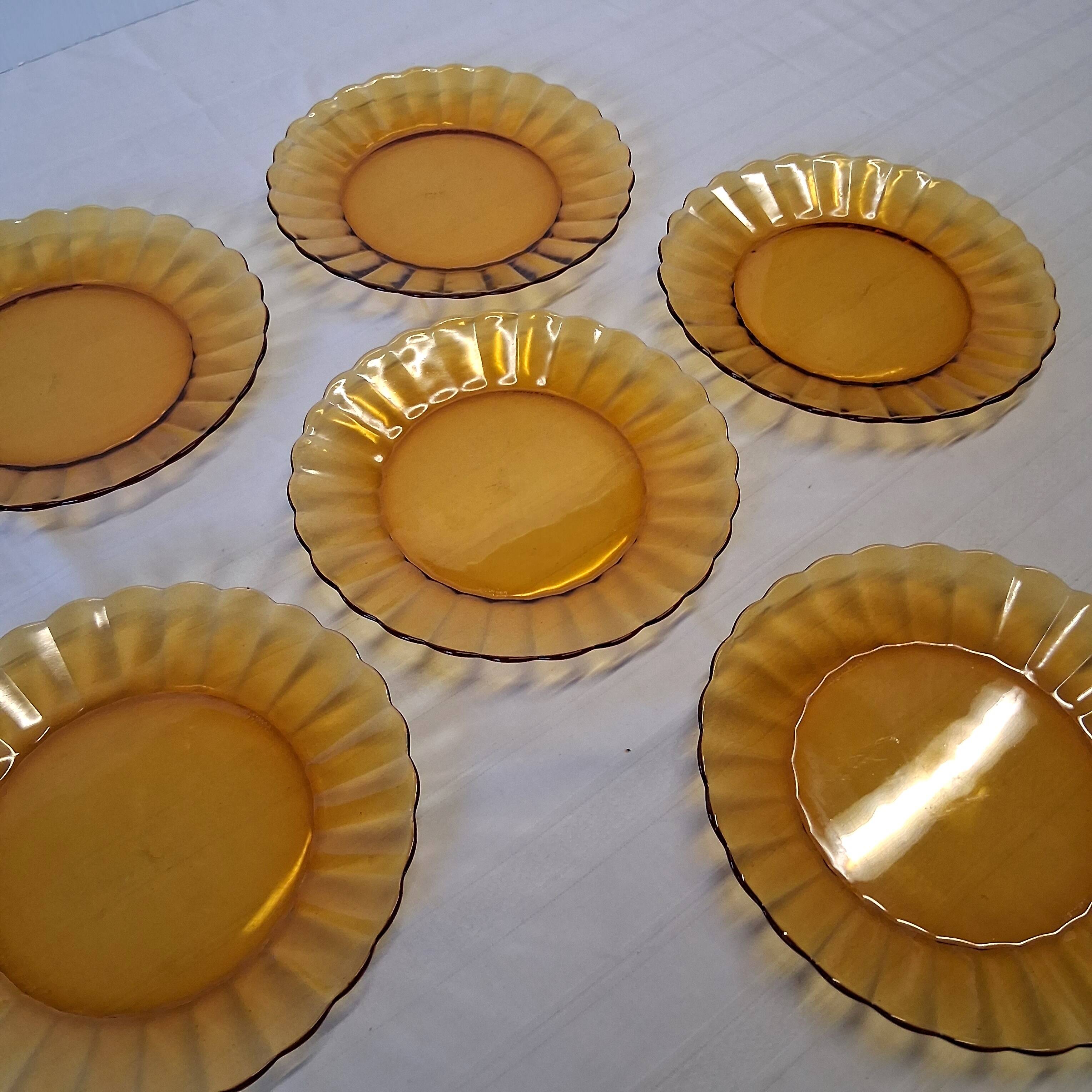 6 Duralex dessert plates in good condition, made of amber-yellow glass