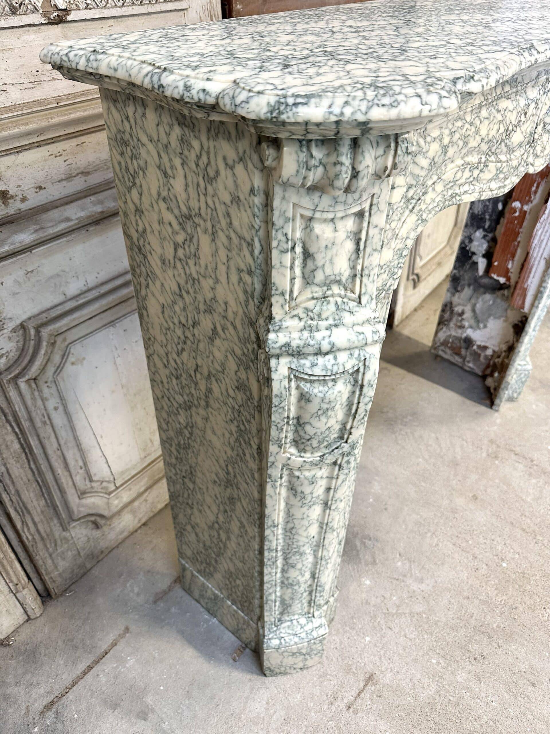 Cheminée en marbre vert style Louis XV