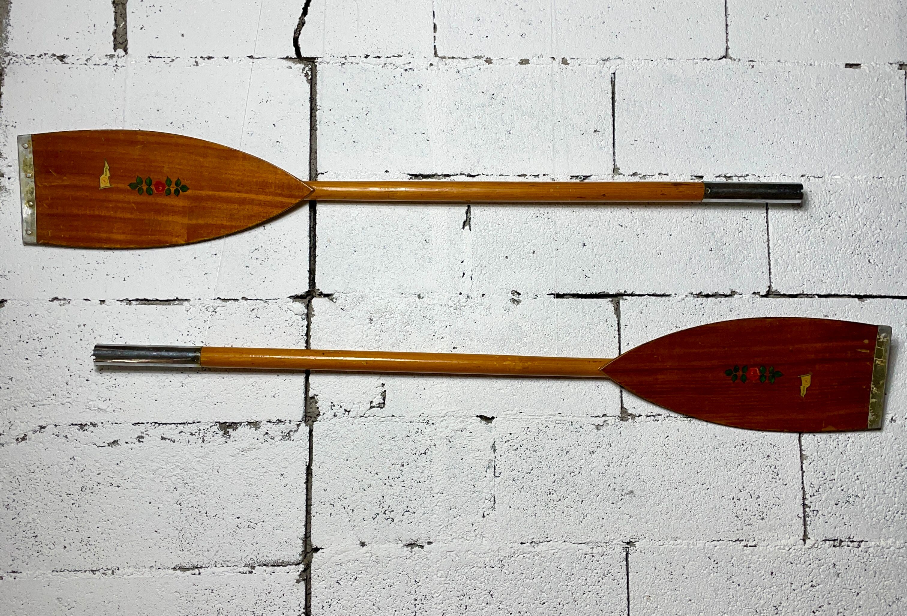 Pair of old wooden paddles