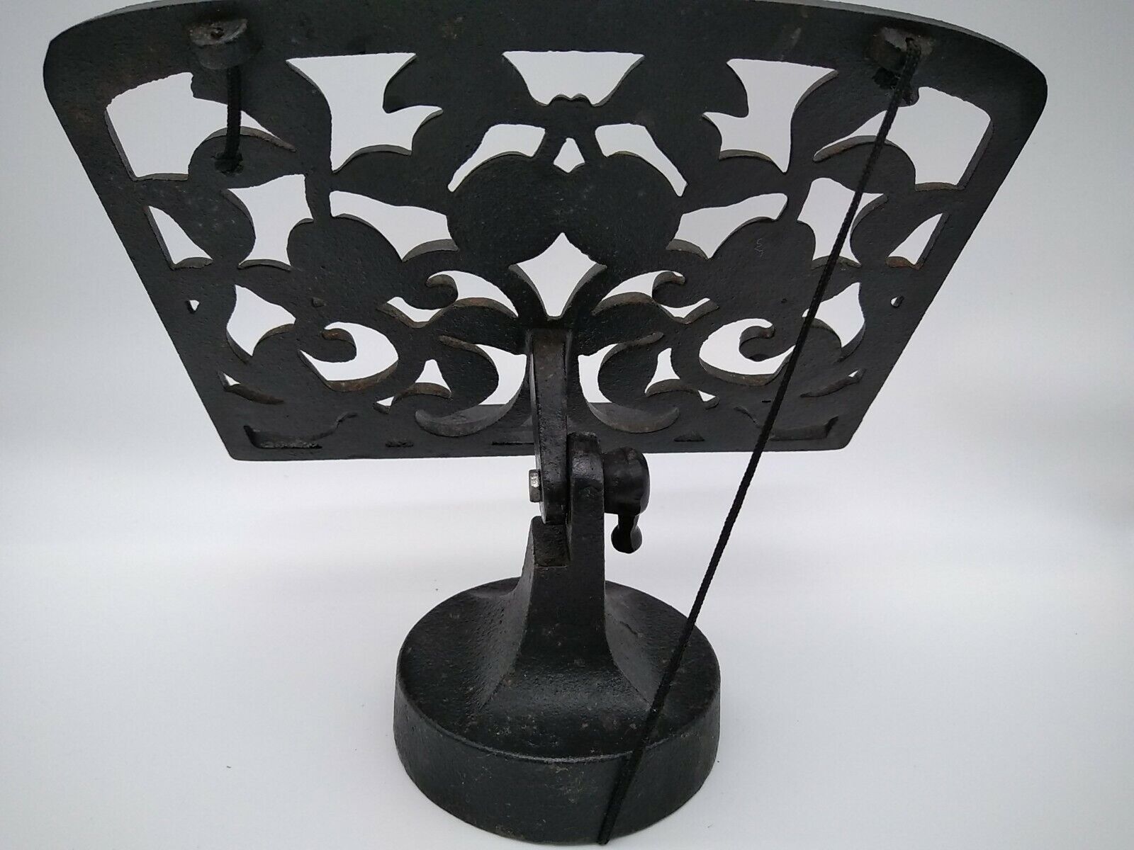 Cast iron lectern or lectrin with fruit decoration.