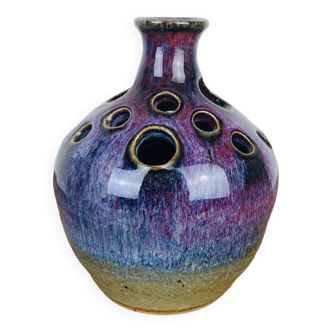 Vase with purple ceramic flowers