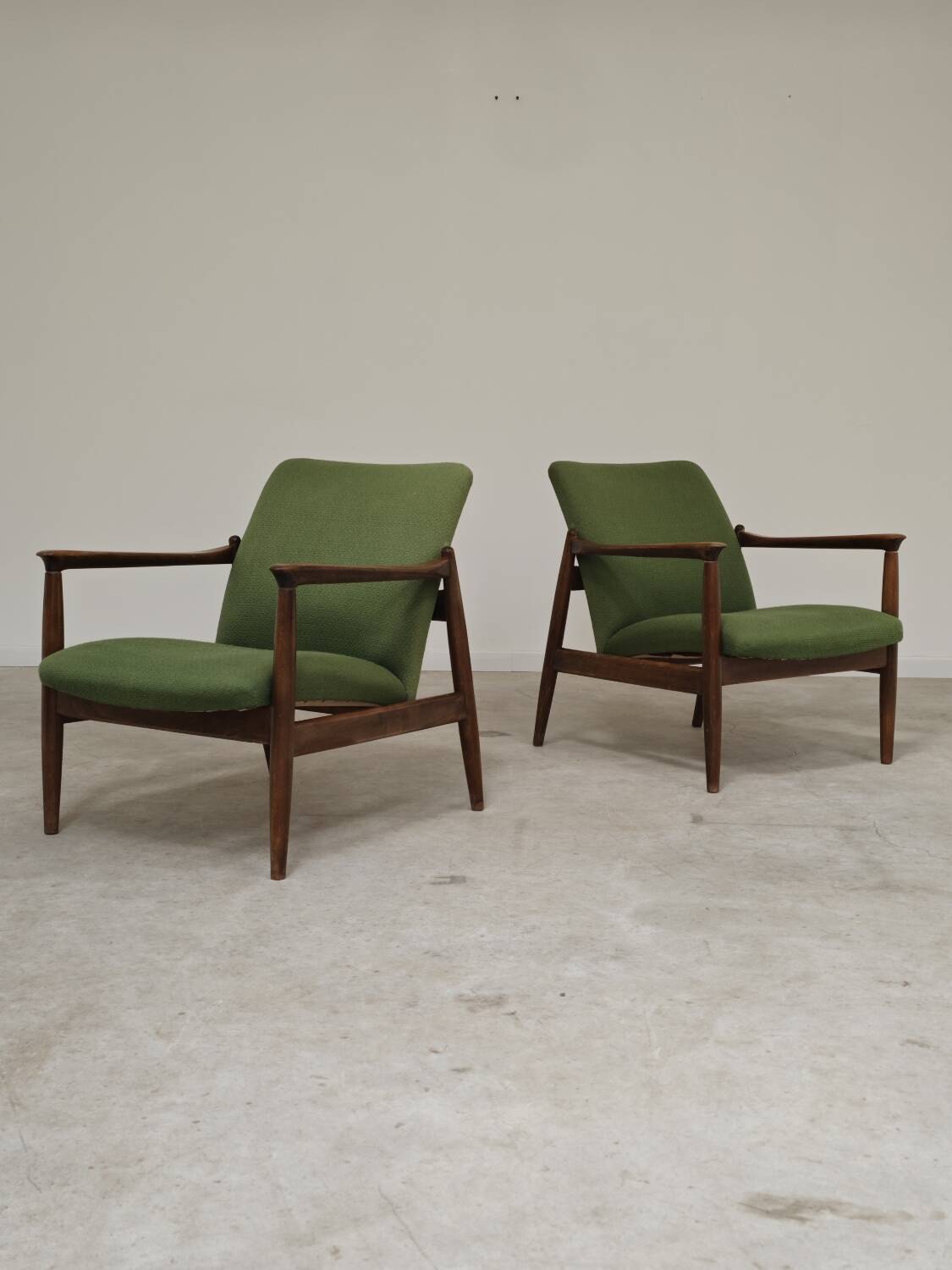 Pair of green GMF 64 armchairs by
Edmund Homa, Poland, 1960s