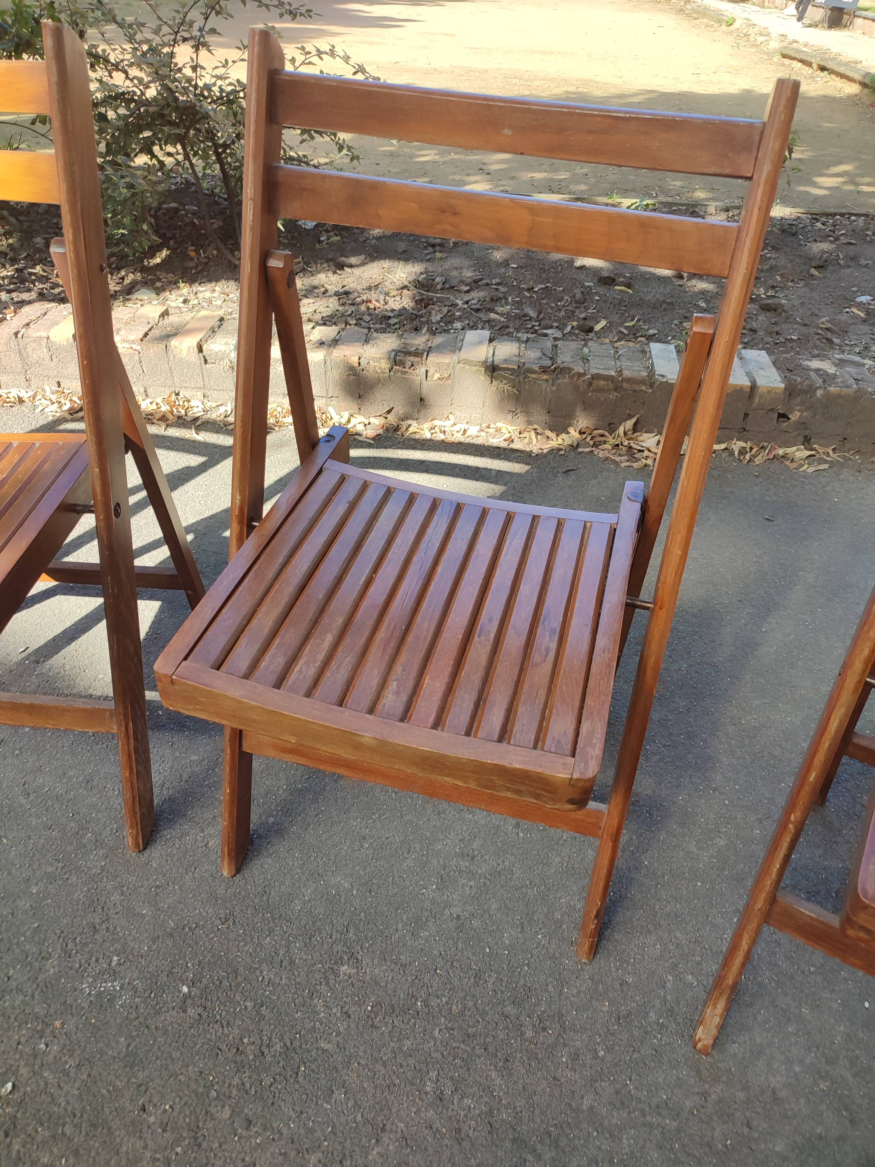 4 folding teak chairs