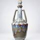 Vintage stoneware bottle with flamed glaze, France 1950-1970.