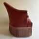 Pink-orange velvet tub chair