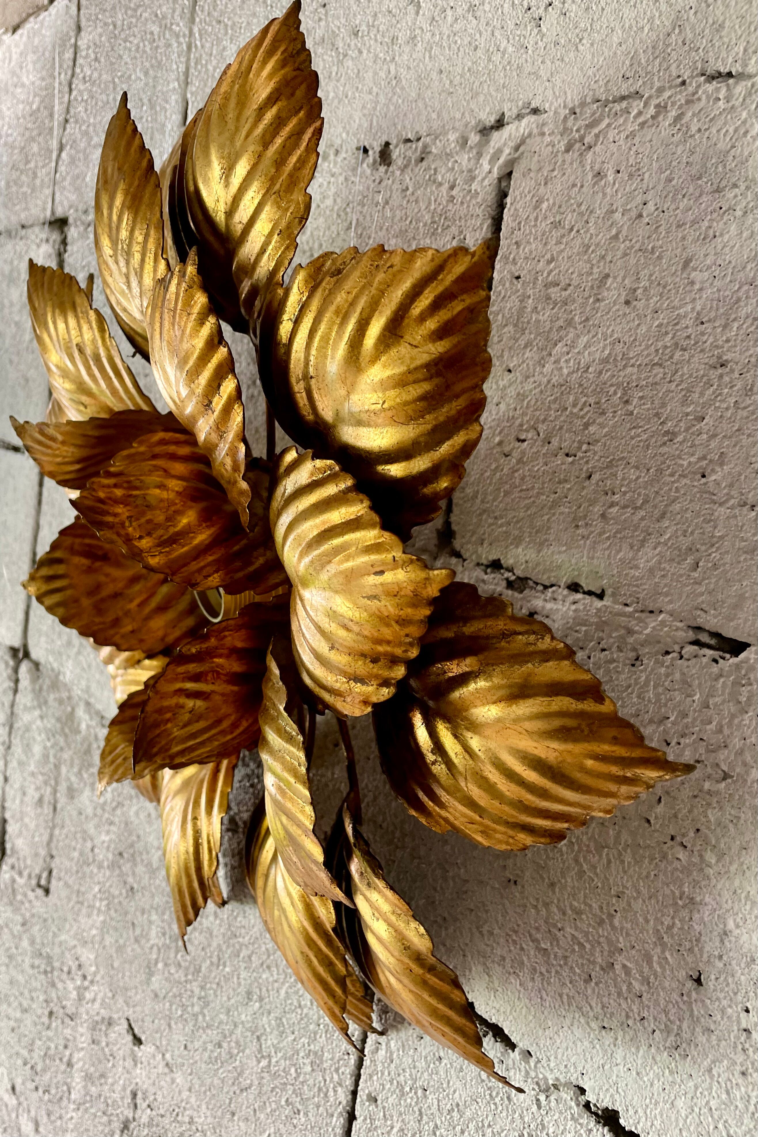 Vintage flower wall lamp in gilded metal