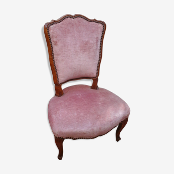 Chaise basse en velours rose