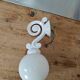 Wall light in cast iron and glass