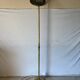 Floor lamp, brass torchère with neoclassical decoration, Empire style.