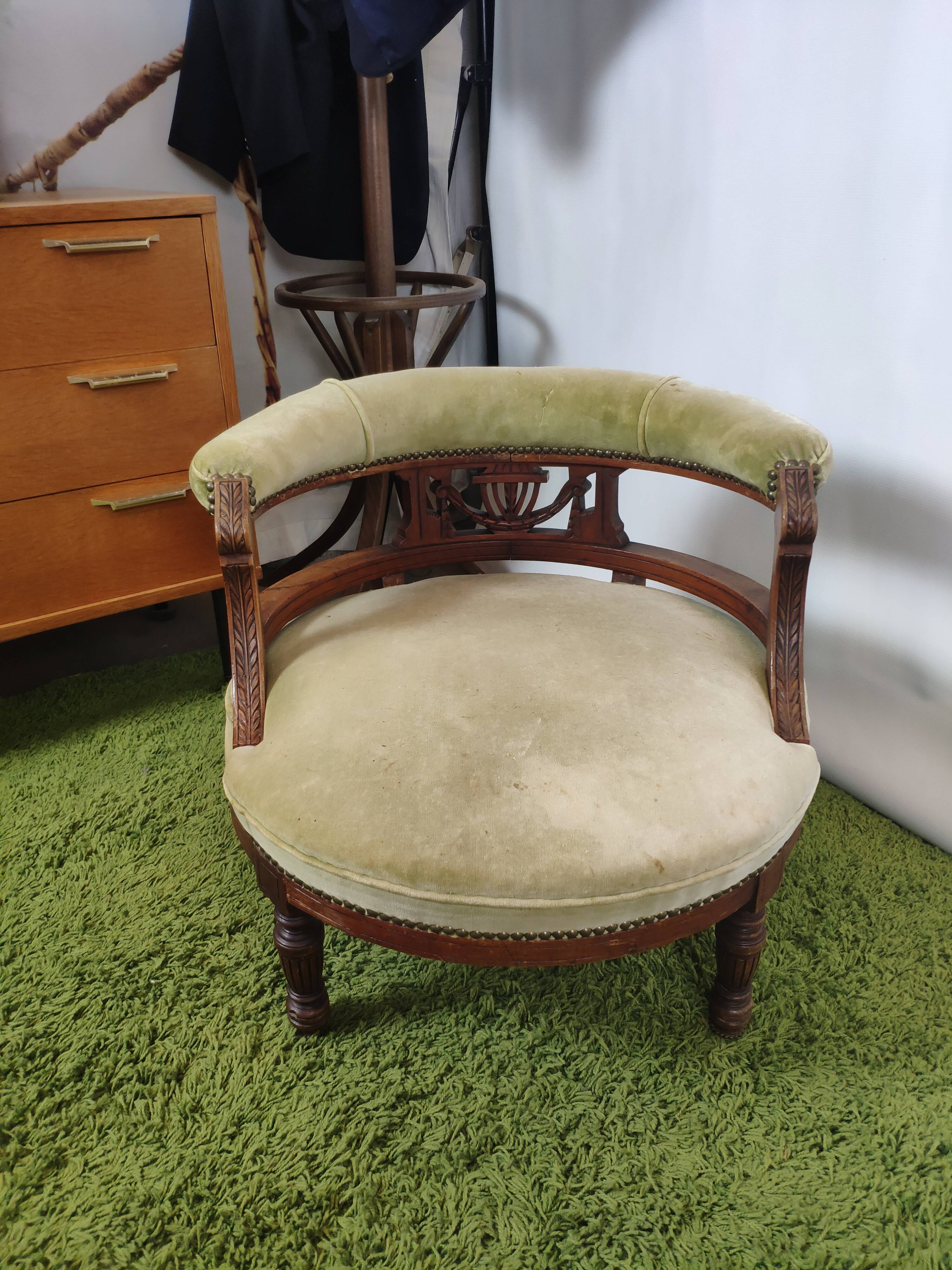 Old green velvet empire chair