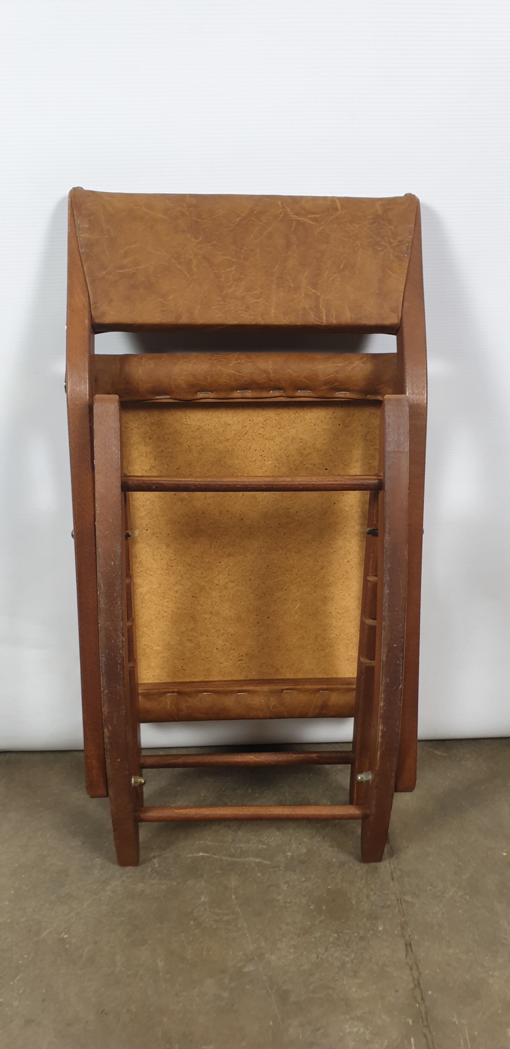 Wooden and leather folding rocking footring