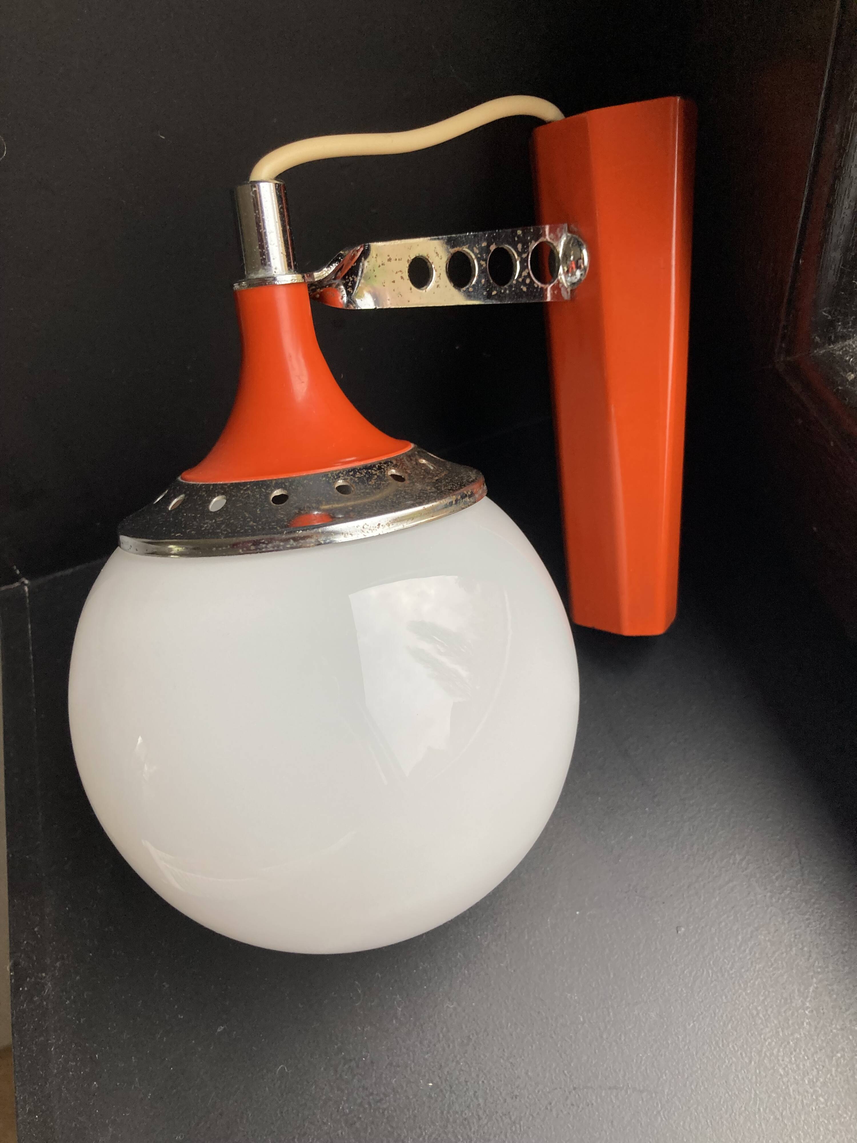 Set of two vintage orange wall lights from the 70s