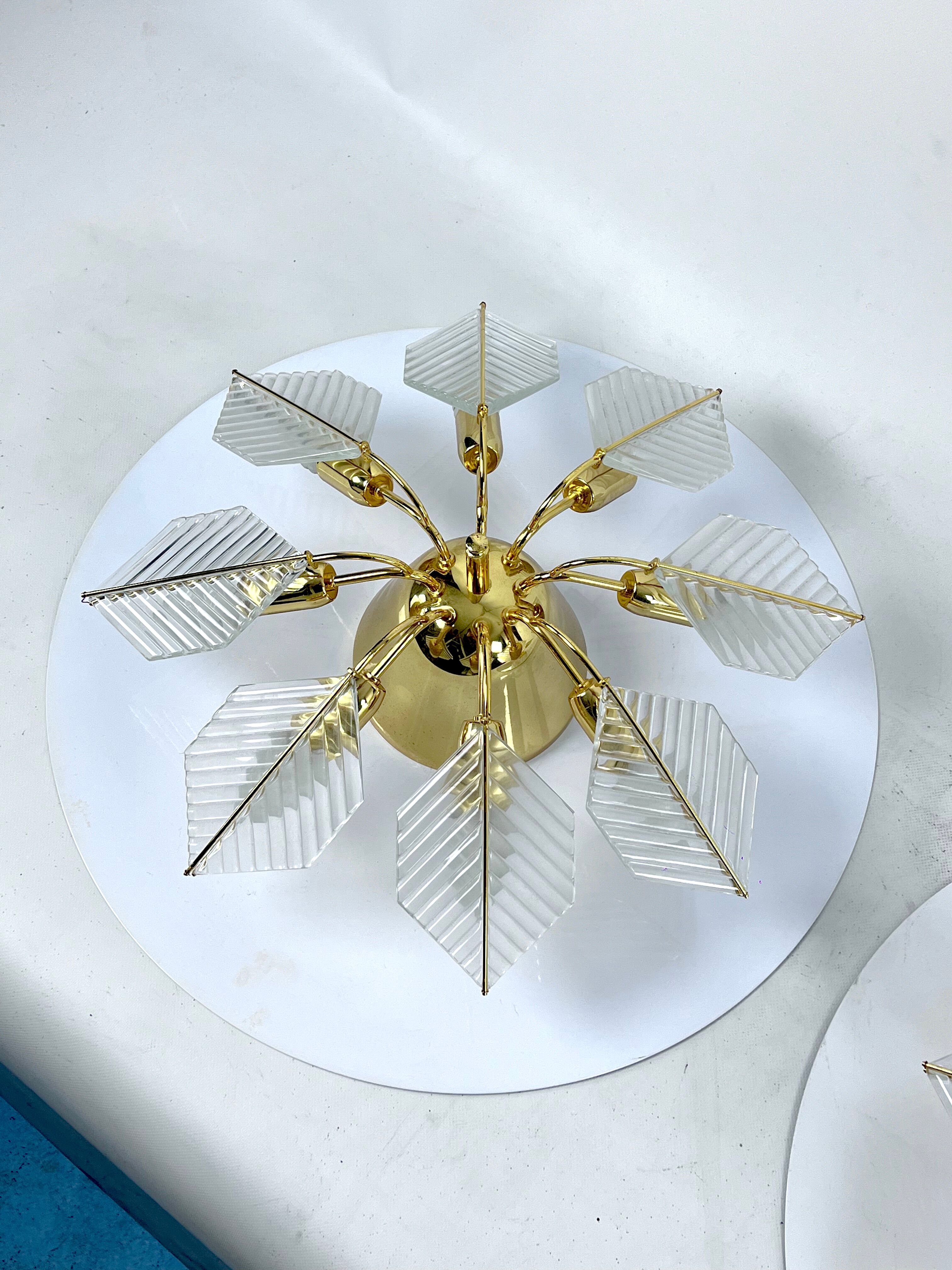 Italian Modern pair of brass ceiling lamps by Zero Quattro. 1970s