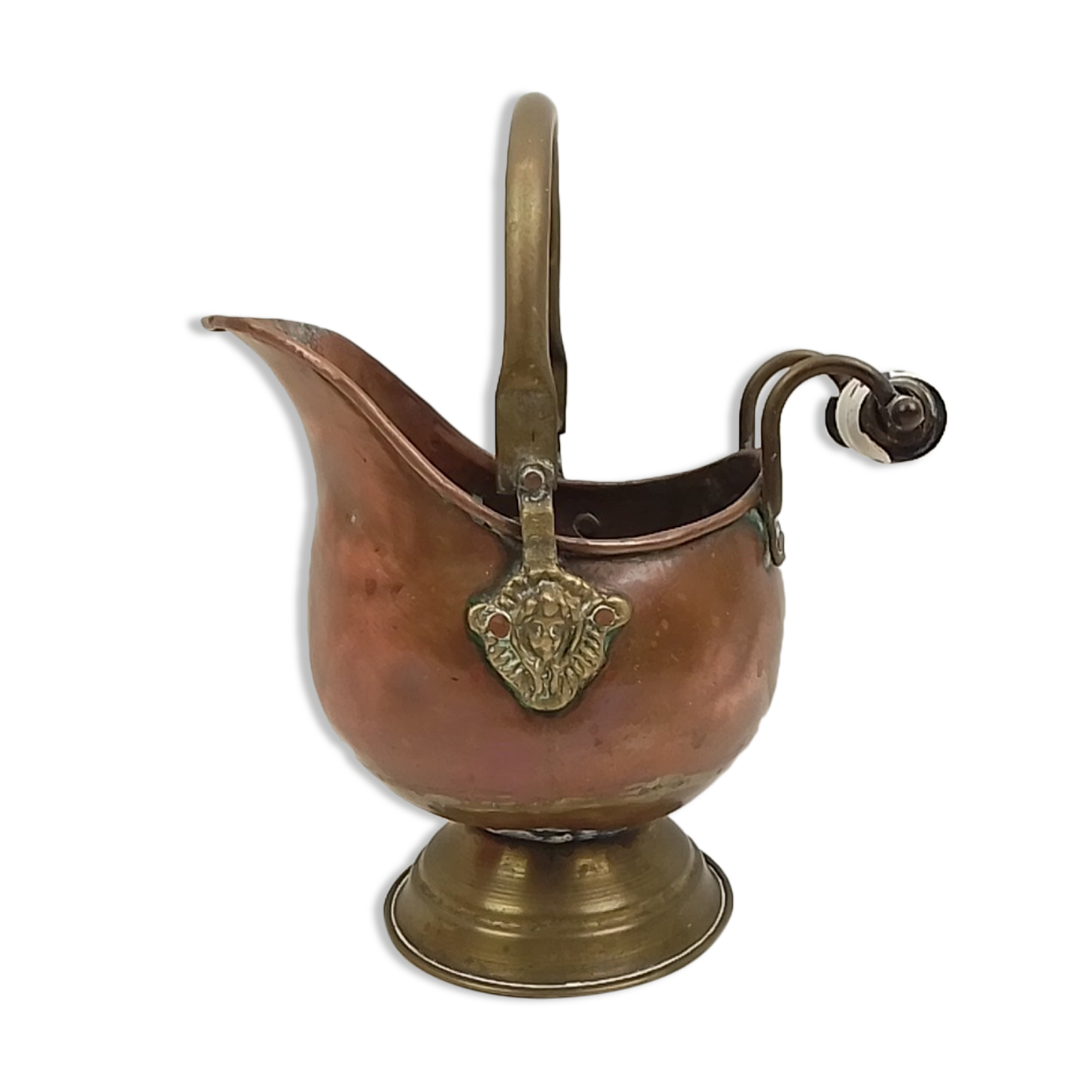Copper pot cover and a pitcher-style brass handle