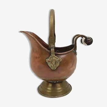 Copper pot cover and a pitcher-style brass handle