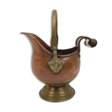 Copper pot cover and a pitcher-style brass handle