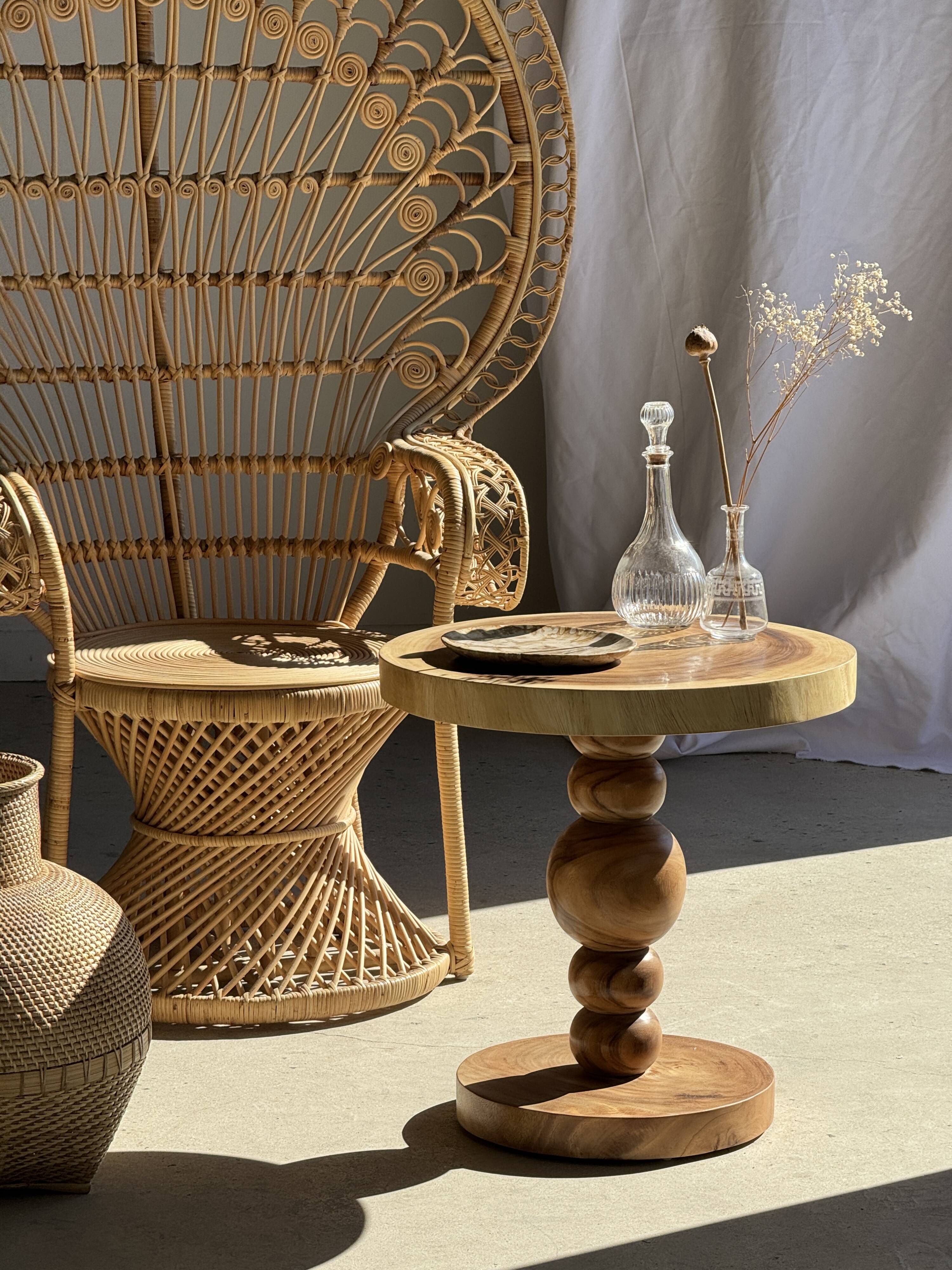 Coffee table in solid suar with central leg and spheres H56.5 D55.5