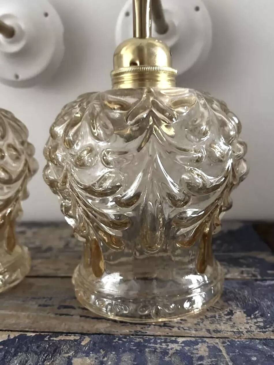 Pair of gold wall sconces