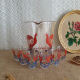 Pitcher and 6 vintage peacock liqueur glasses