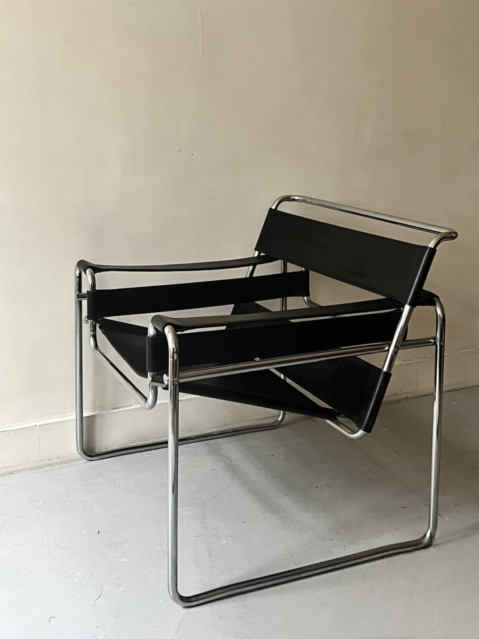 Wassily tubular armchair in chrome & black leather, designed by Marcel Breuer in 1970.