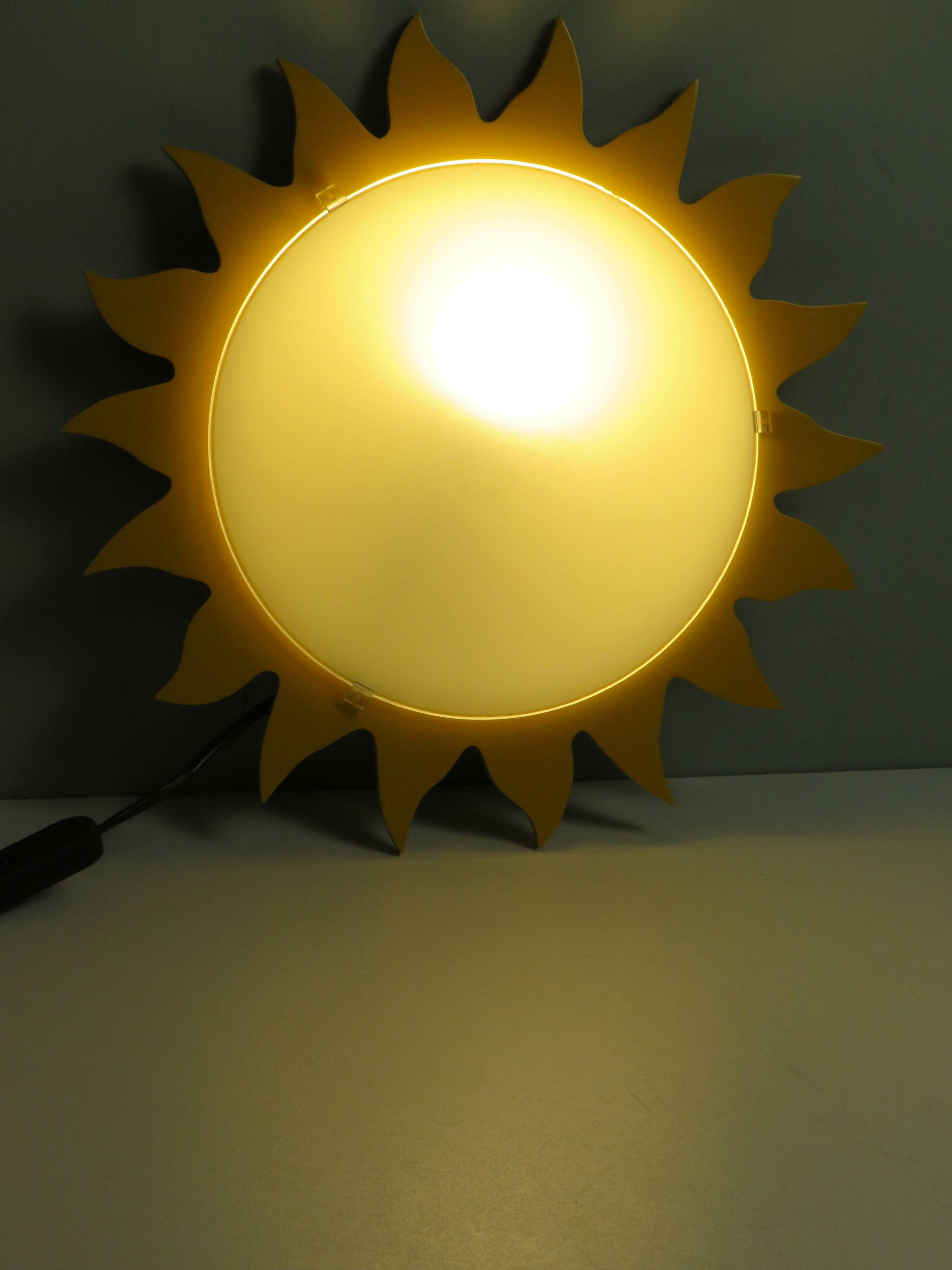 Vintage "sun" ceiling light Massive Belgium in opaline glass and lacquered wood.