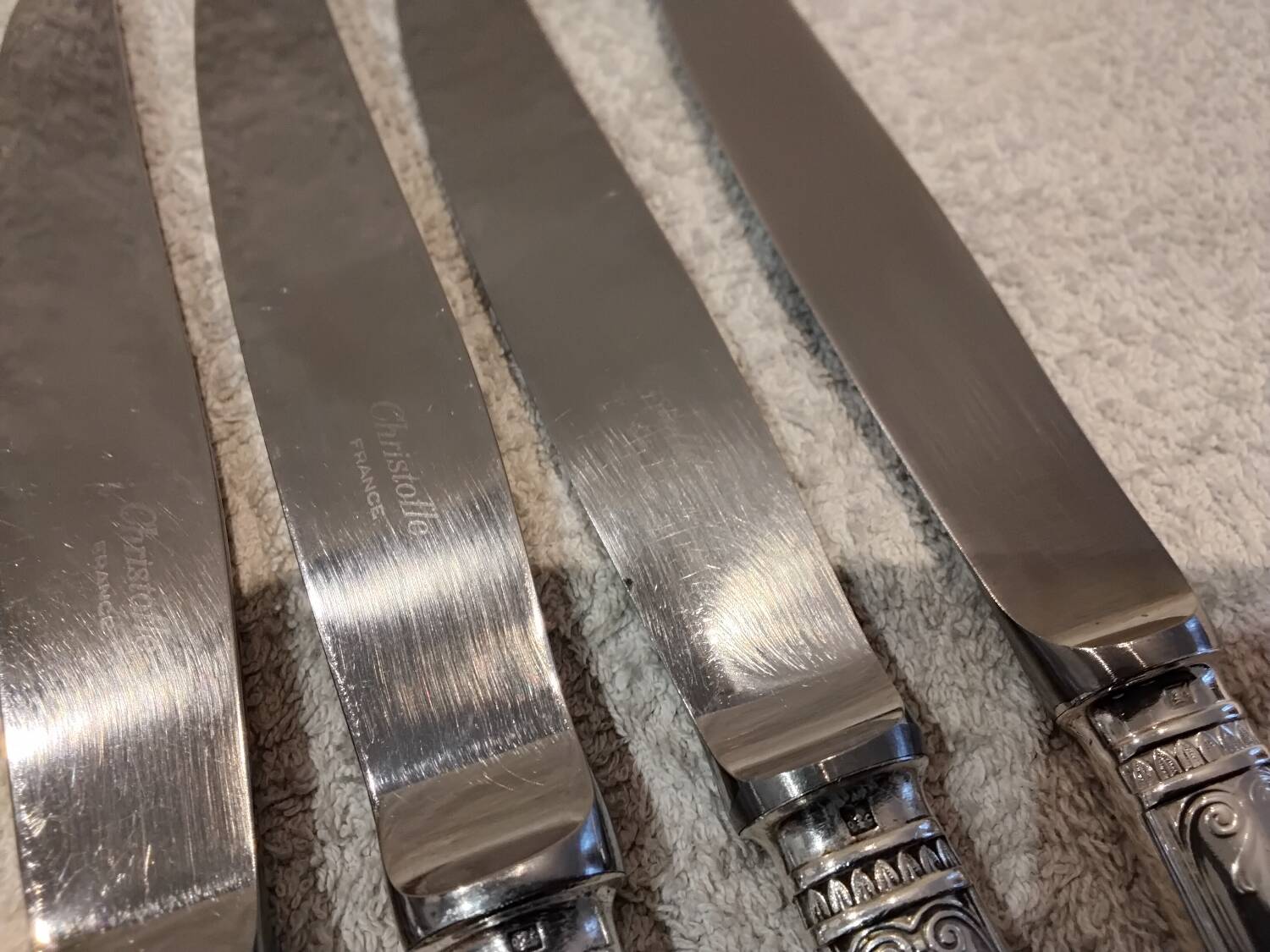 4 table knives with silver-plated metal handles, silversmith Christofle Malmaison