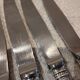 4 table knives with silver-plated metal handles, silversmith Christofle Malmaison