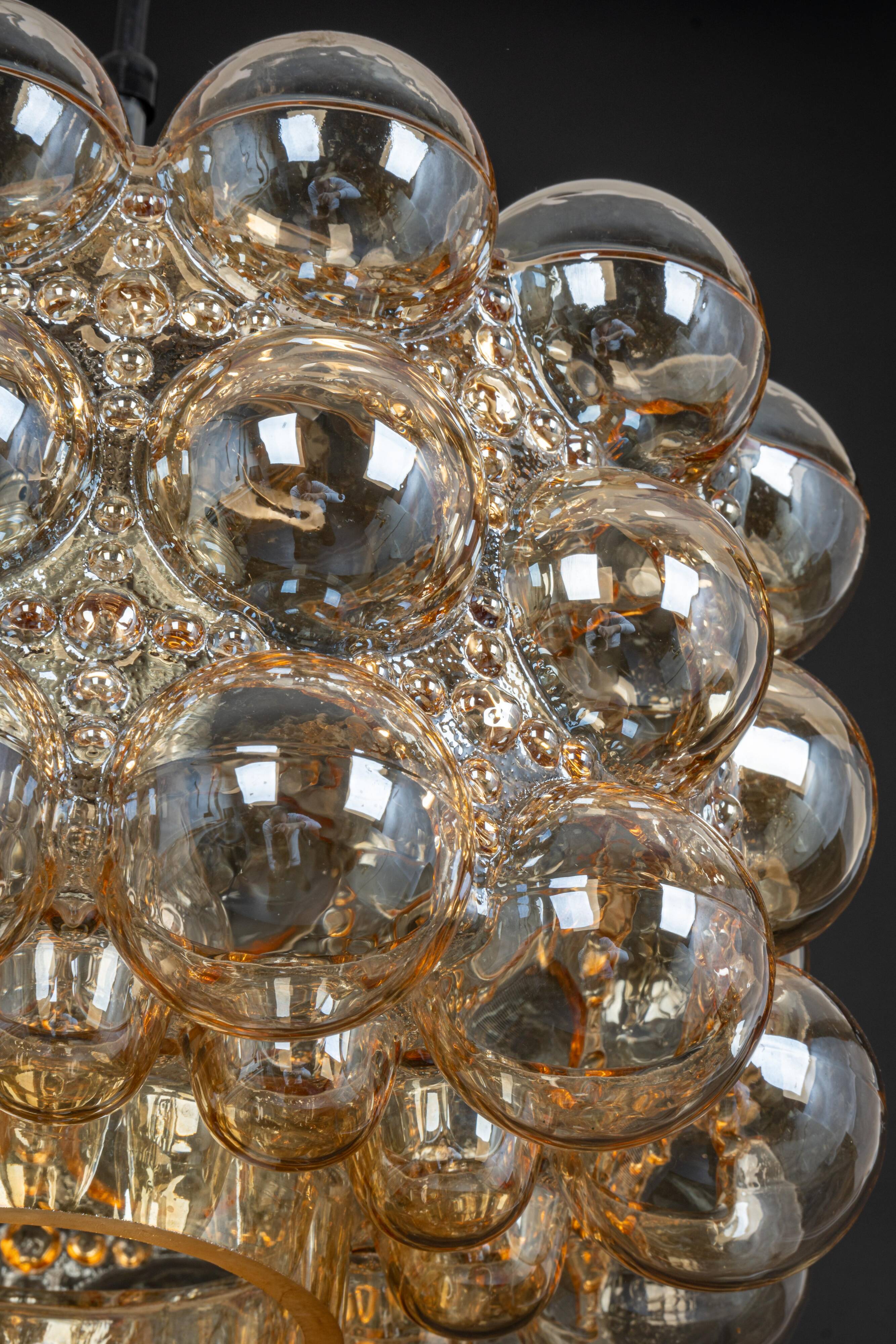 Large amber bubble glass pendant light by Helena Tynell for Limburg, Germany, 1970s.