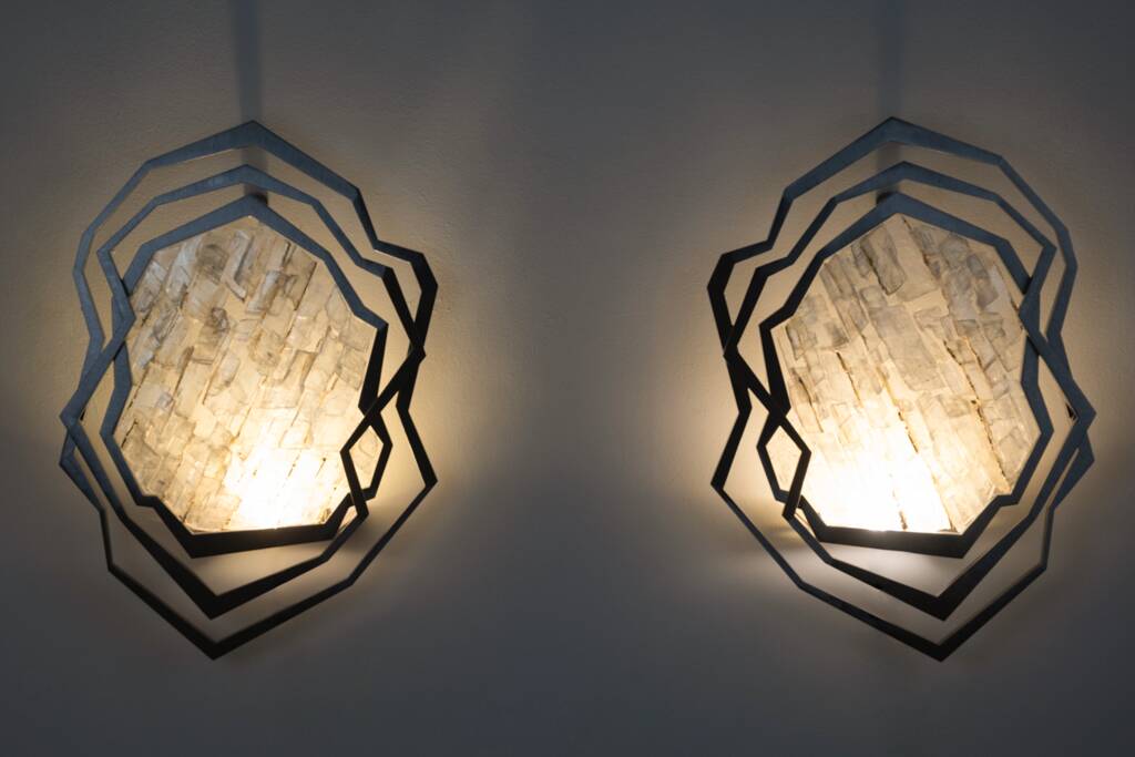 Pair of brushed metal and rock crystal wall lights. Contemporary.