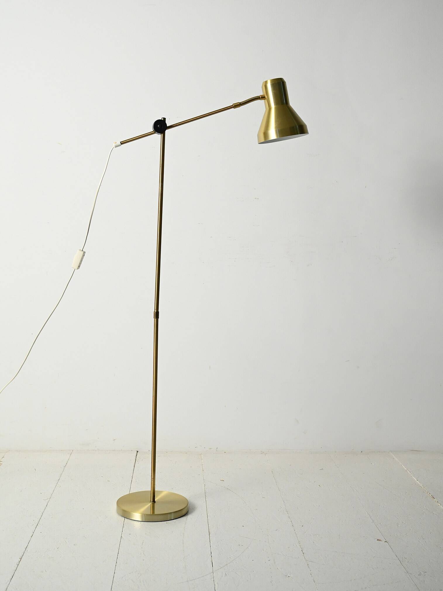 Scandinavian brass floor lamp with adjustable arm