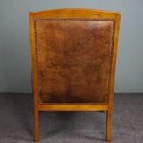 Armchair in sheepskin with beautiful light wood