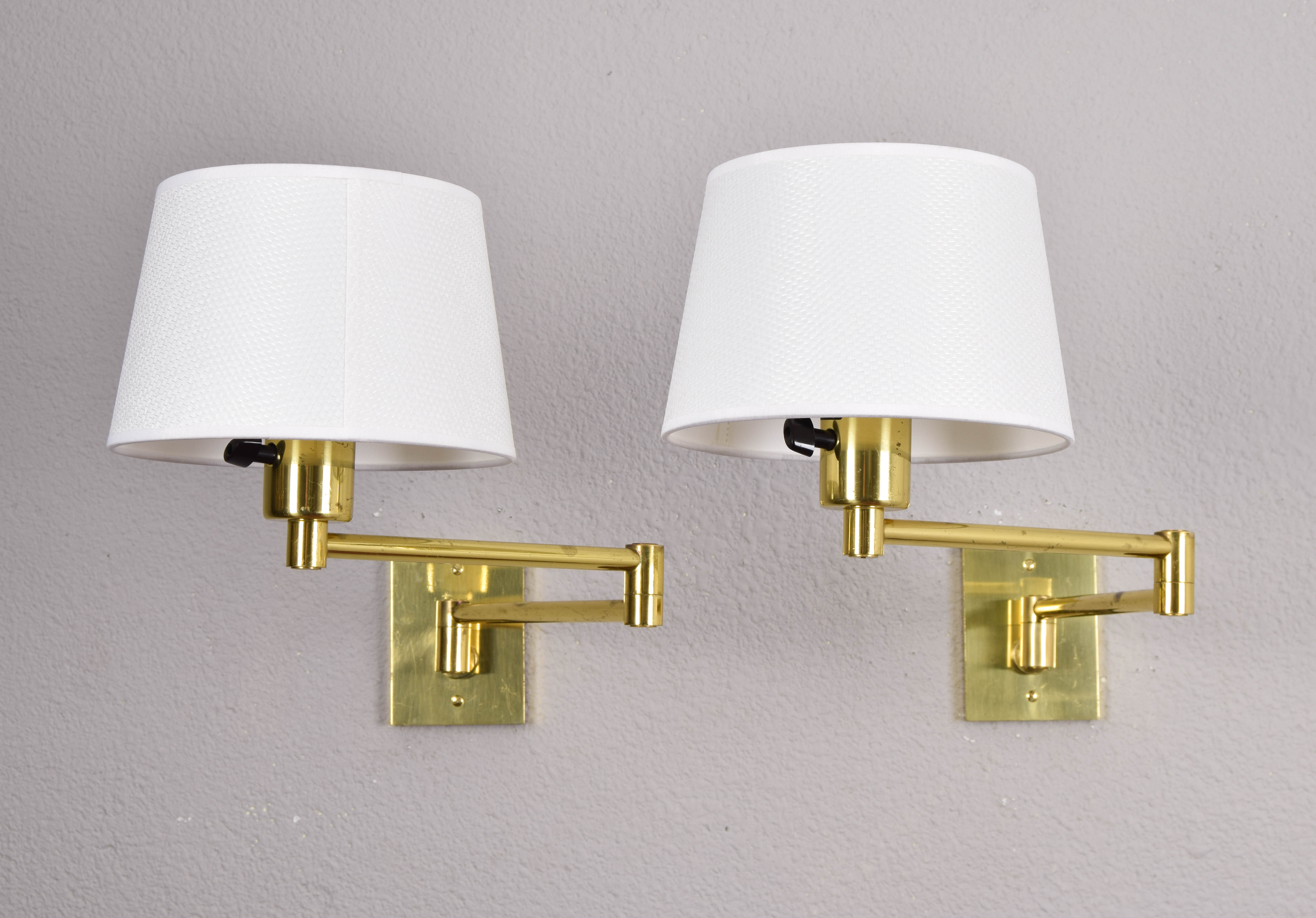 Two Mid-Century Modern Swing Arm Brass Sconces by George W Hansen for Metalarte