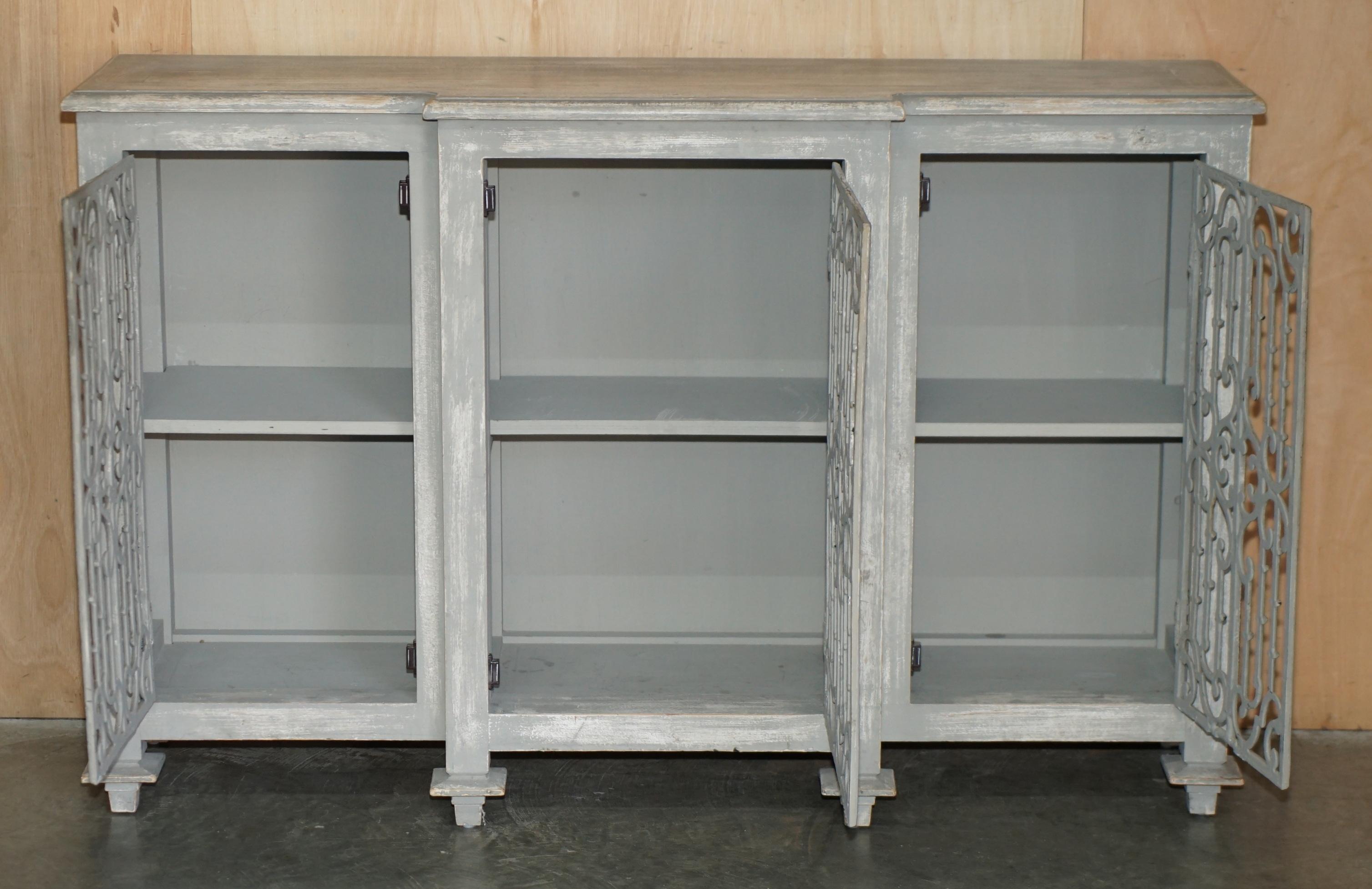 Vintage sideboard with wrought iron doors