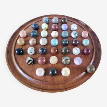 Exotic wood solitaire game and 38 semi-precious stone balls